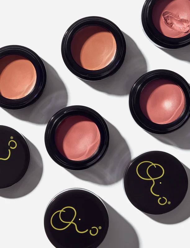 Two shades of OIO Lab Melting Blush tinted balm displayed side by side