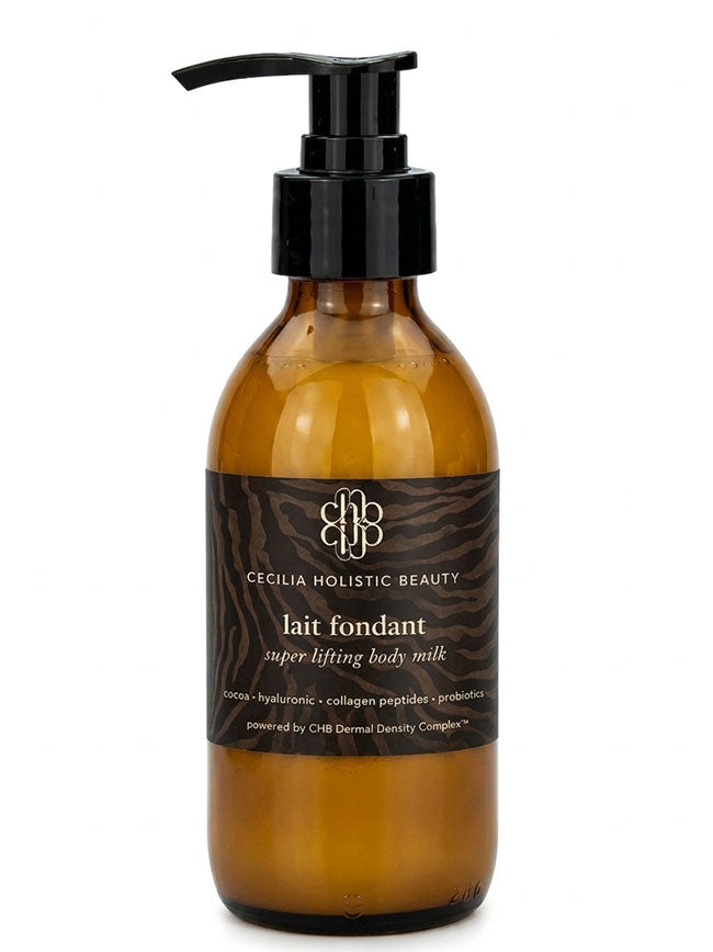 Amber bottle of Cecilia Holistic Beauty body milk with pump on a white background