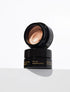 OIO Lab Hyperfresh Balm Quantum Glow skin enhancing highlighter balm on clean background