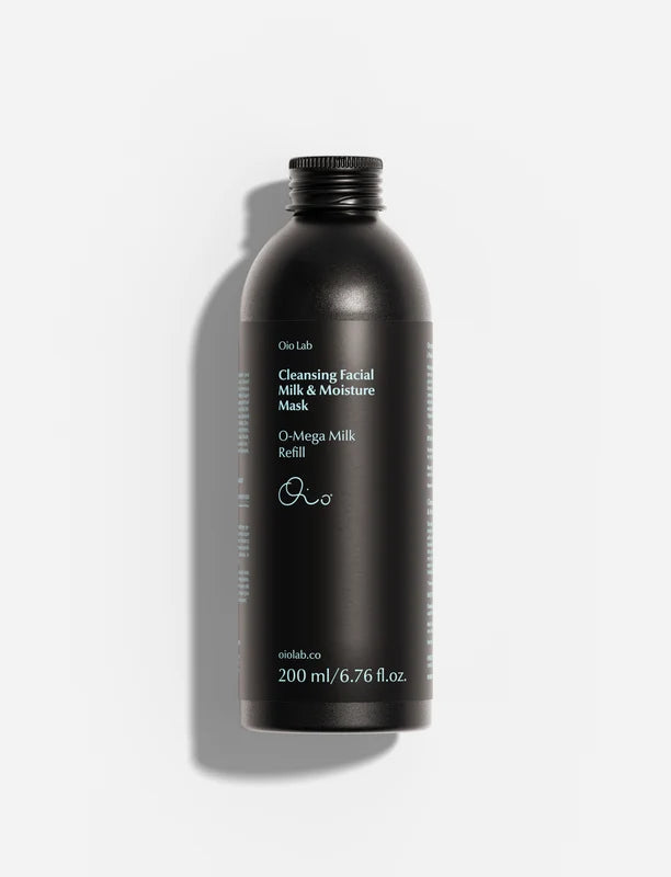 Aluminum refill bottle of Oio Lab Cleansing Facial Milk &amp; Moisture Mask refill, shown against a light gray background with a soft shadow.