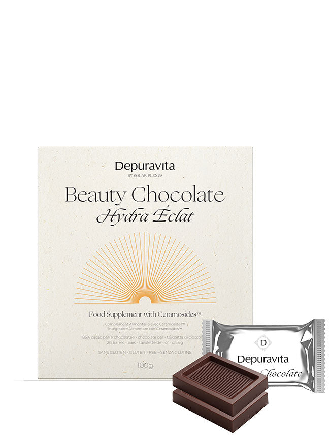Depuravita Beauty Chocolate Hydria Eclat packaging with a bar of chocolate and a packet on a white background