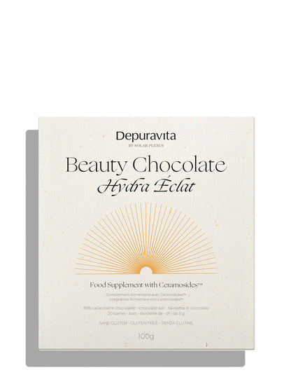 Depuravita Beauty Chocolate Hydra Éclat food supplement packaging, featuring a cream-colored box with elegant black typography and a gold sunburst graphic on a white background.