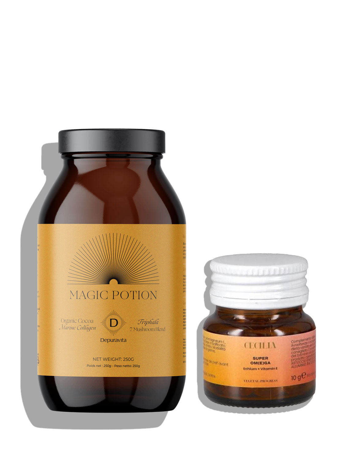 A large amber glass bottle with a black lid and a tan label reading &